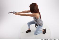 MOLLY SITTING POSE WITH GUN